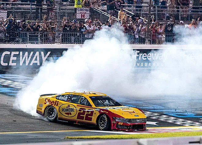 Joey Logano holds off Chase Briscoe at Richmond Raceway